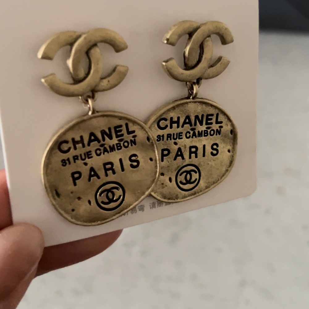 Bigger earrings dangling